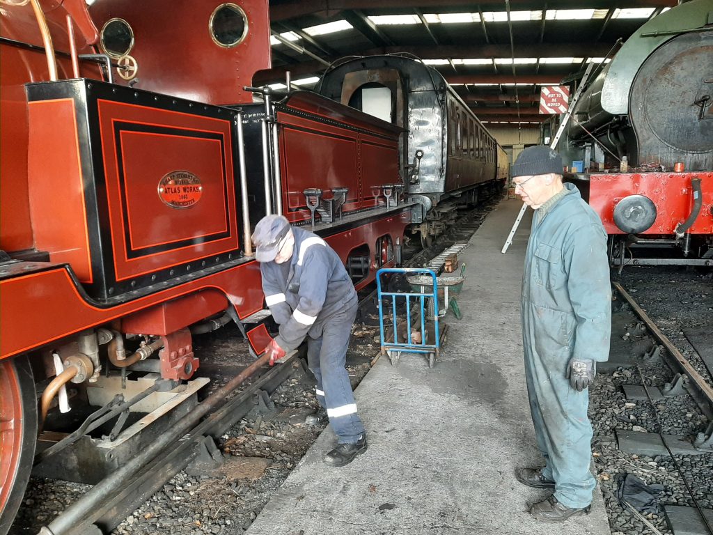 Ron Crowe moving FR 20 forward with a pinch bar.