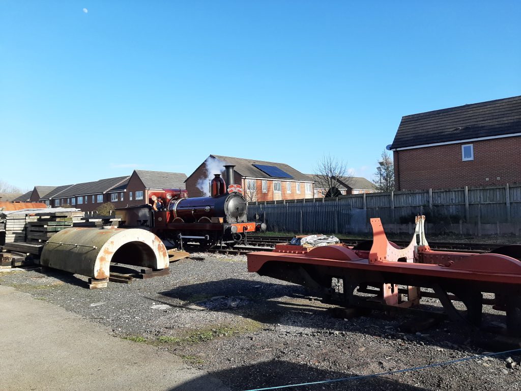 FR 20 passing Fr 25's chassis and tank