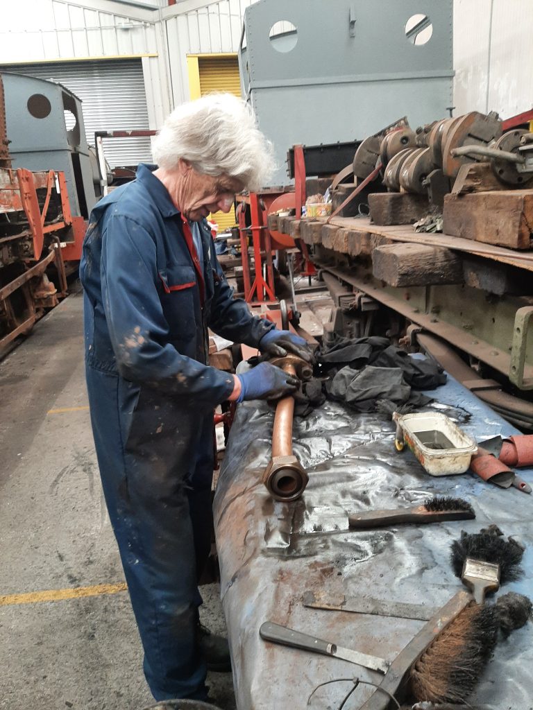 Ed cleaning one of Cumbria's water valve pipes
