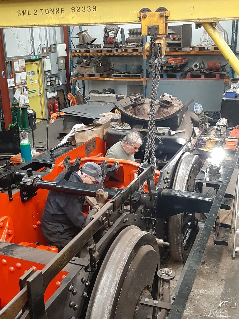 Ron and Keith working inside 5643's frames