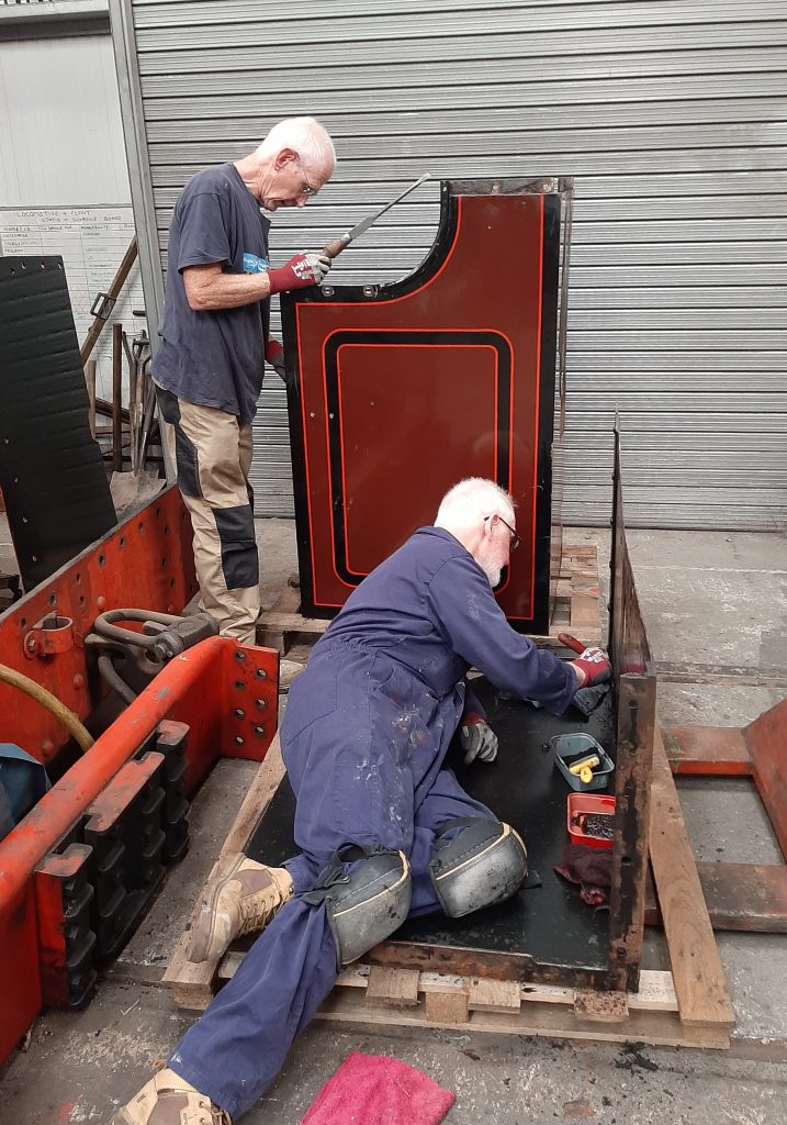 Jon and Sim working on Cumbria's cab sides.